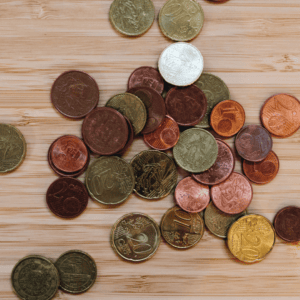 De la monnaie pour illustrer la question : combien gagne un franchisé.