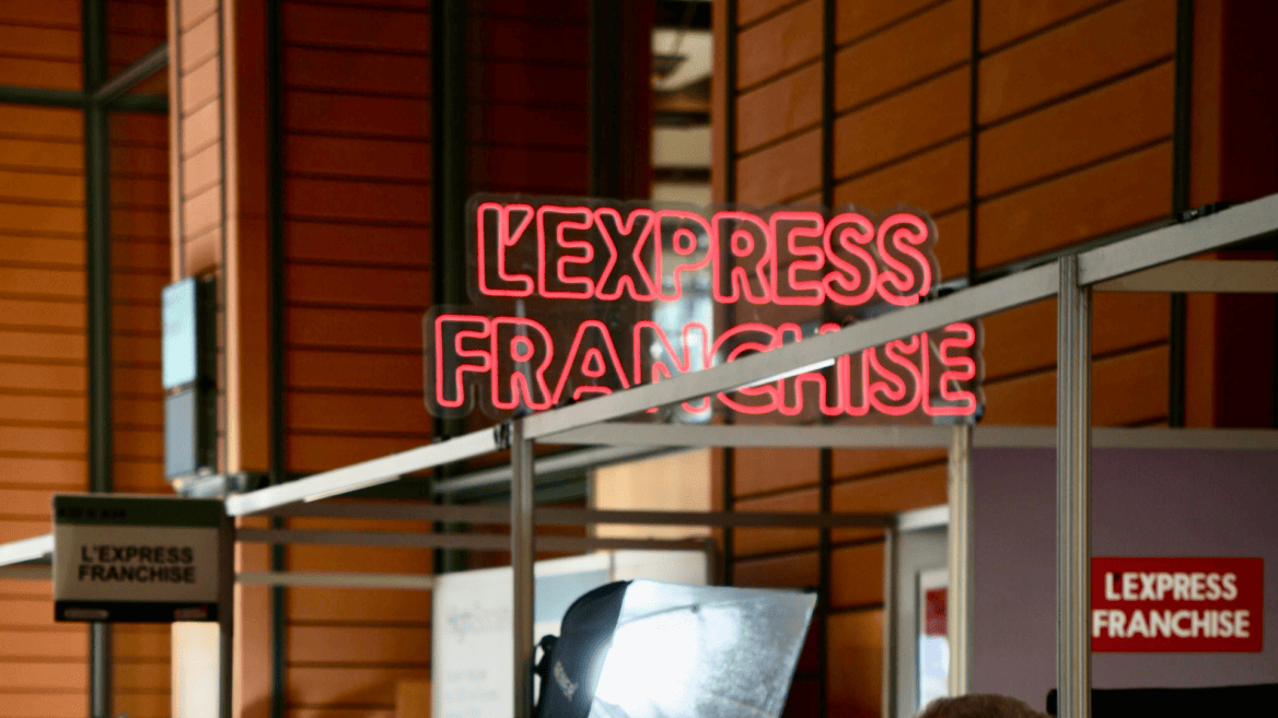 Stand L'Express Franchise lors du forum franchise Lyon 2023.