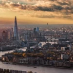 beautiful autumn view of the london skyline with river thames, tower bridge and the modern skyscrapers, united kingdom