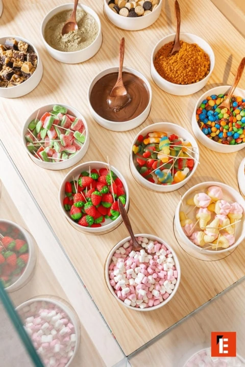 estación de coberturas y dulces para postres