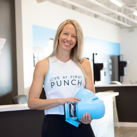 woman boxing in modern hiit studio