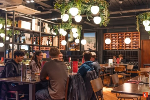 Delicious cannoli on a grey plate.