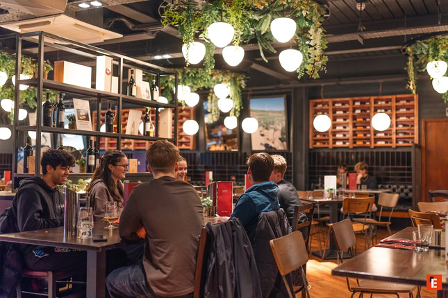 Delicious cannoli on a grey plate.