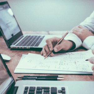 close up on of two people working on computers