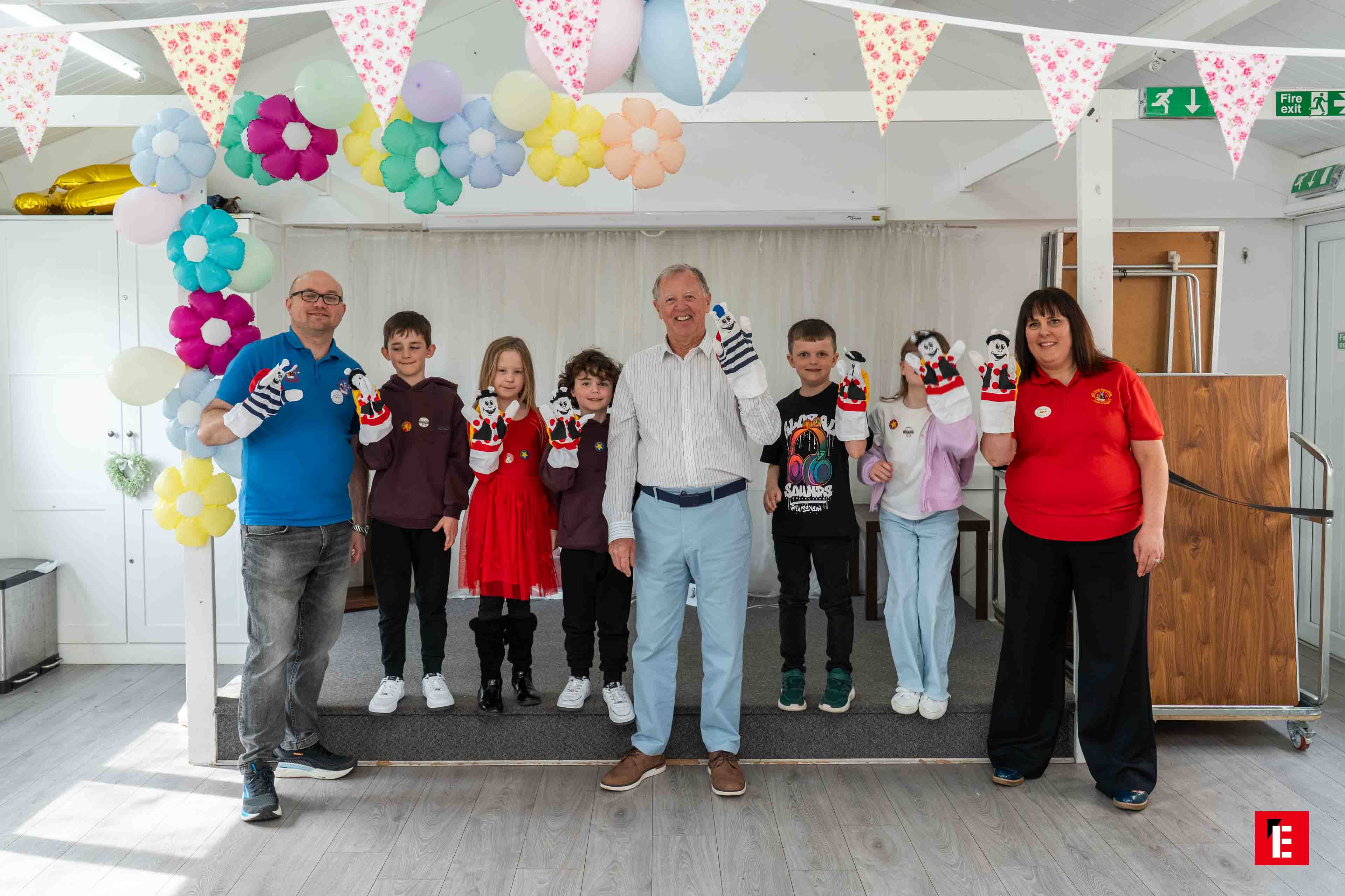 community puppet workshop with colorful balloons