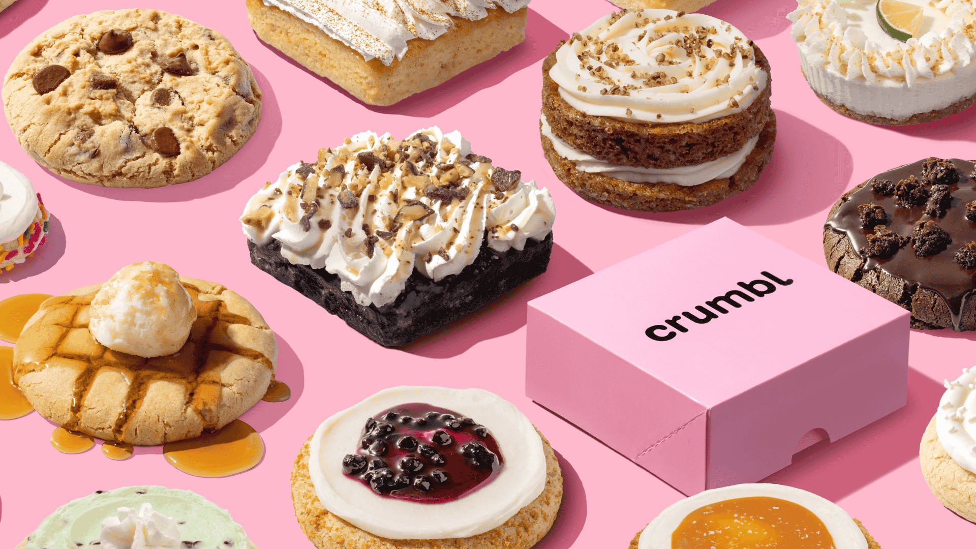 crumbl cookie assortment on bubblegum pink
