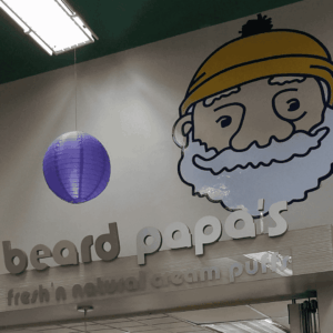 beard papas cream puff kiosk with bearded mascot