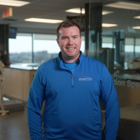 physiothérapeute souriant – action sport physio