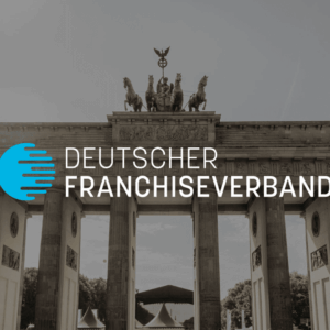 brandenburger tor berlin mit deutschem franchiseverband logo