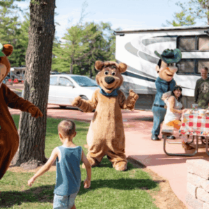 family picnic with bear mascots at rv campground