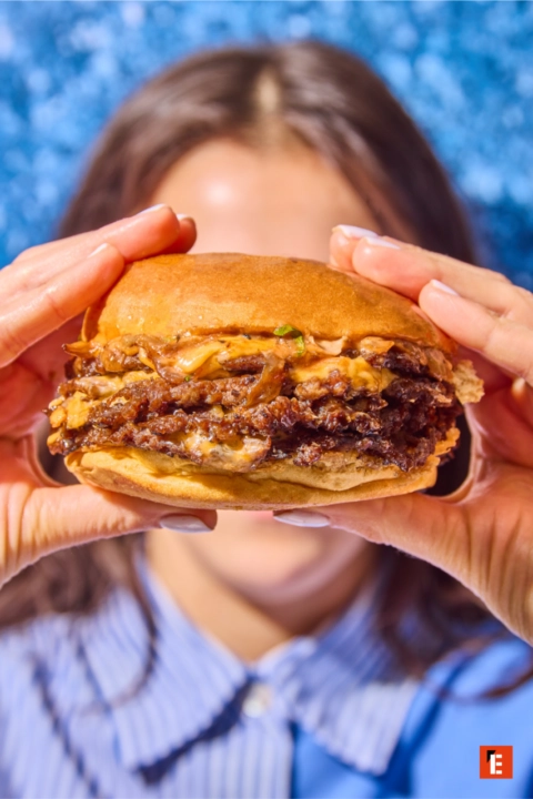 mouthwatering stacked double cheeseburger close up