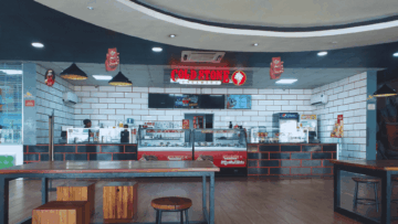 bright modern ice cream counter with communal table