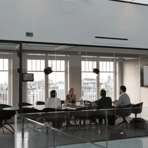 modern glass conference room for hybrid meetings