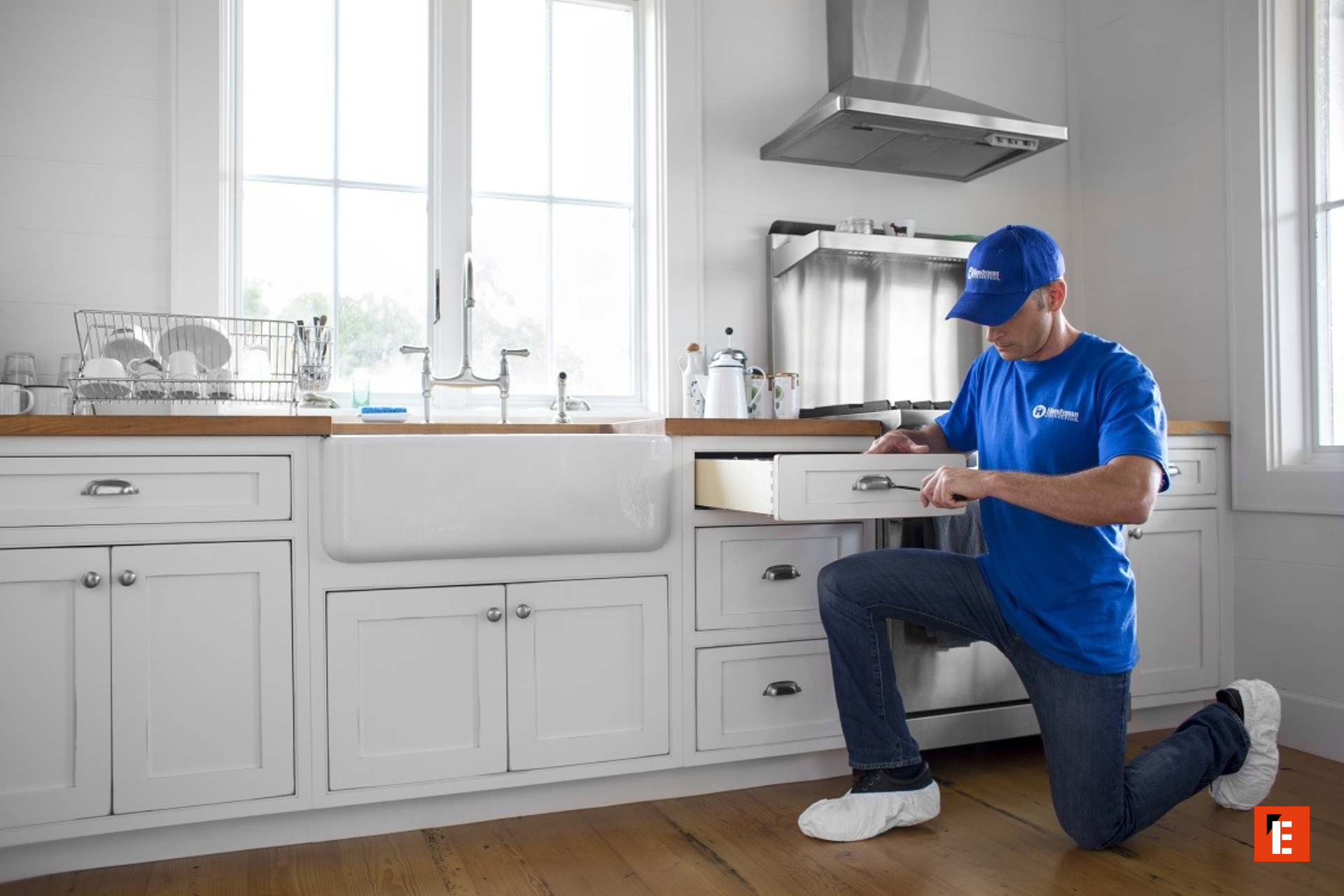 kitchen technician repairing farmhouse drawer