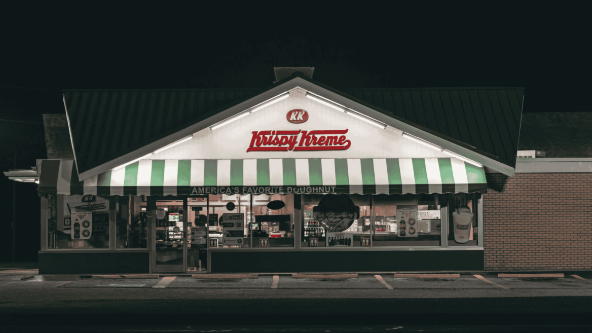 krispy kreme neon doughnut storefront at night