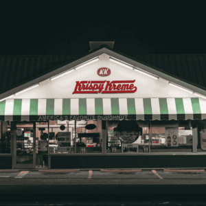 krispy kreme neon doughnut storefront at night