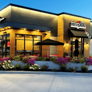 modern restaurant patio at dusk with warm lighting