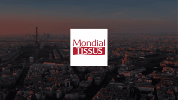 panorama de paris au crépuscule avec logo mondial tissus