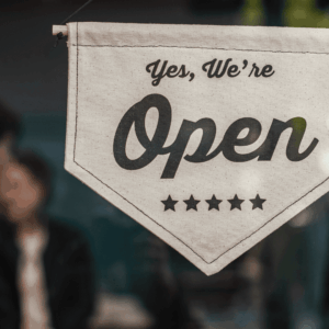 handcrafted fabric open sign in shop window