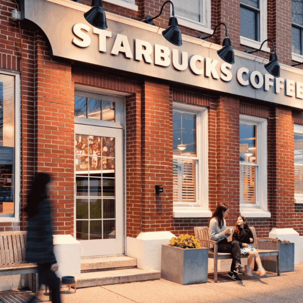 cozy neighborhood starbucks storefront in brick building