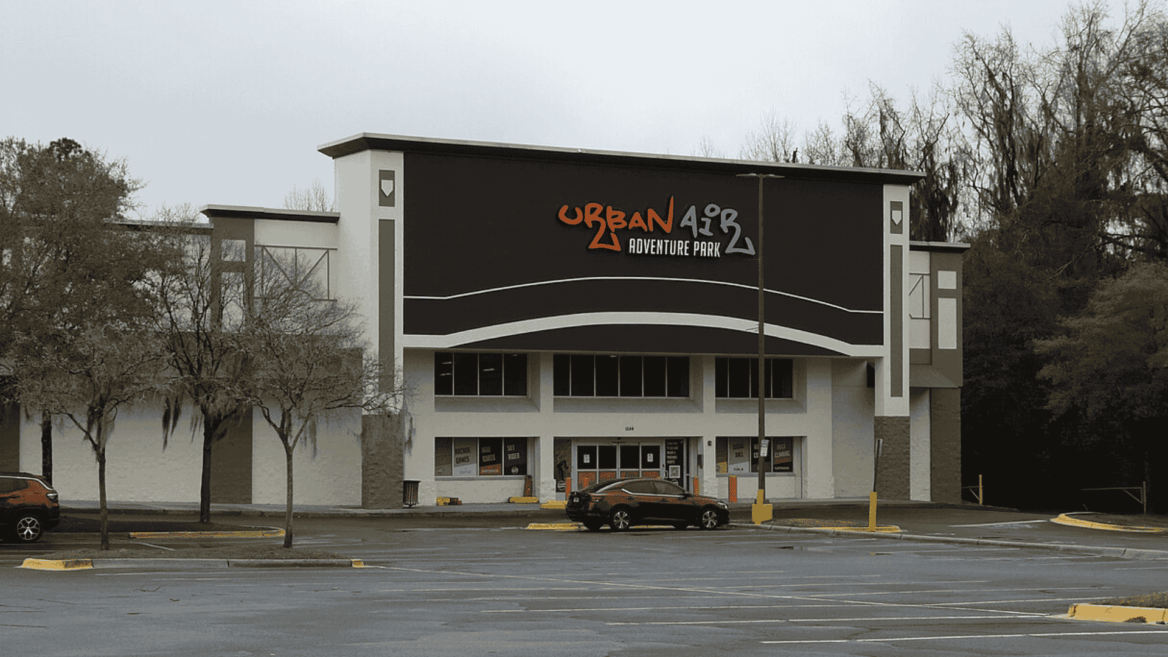 urban air adventure park exterior, empty parking lot