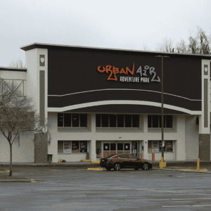 urban air adventure park exterior, empty parking lot