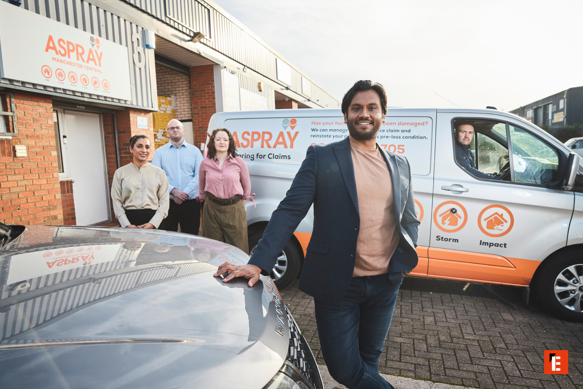 aspray team with branded service van in manchester