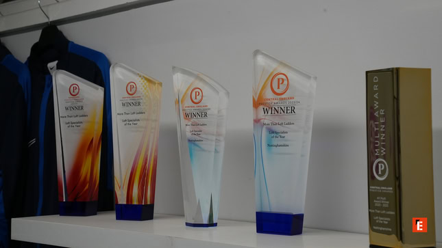 award trophy display with multi award plaque