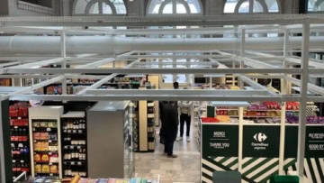carrefour express : Épicerie urbaine sous voûte historique