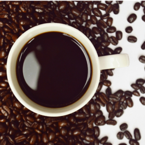 top view coffee cup and beans — black sheep coffee