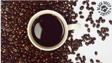 top view coffee cup and beans — black sheep coffee