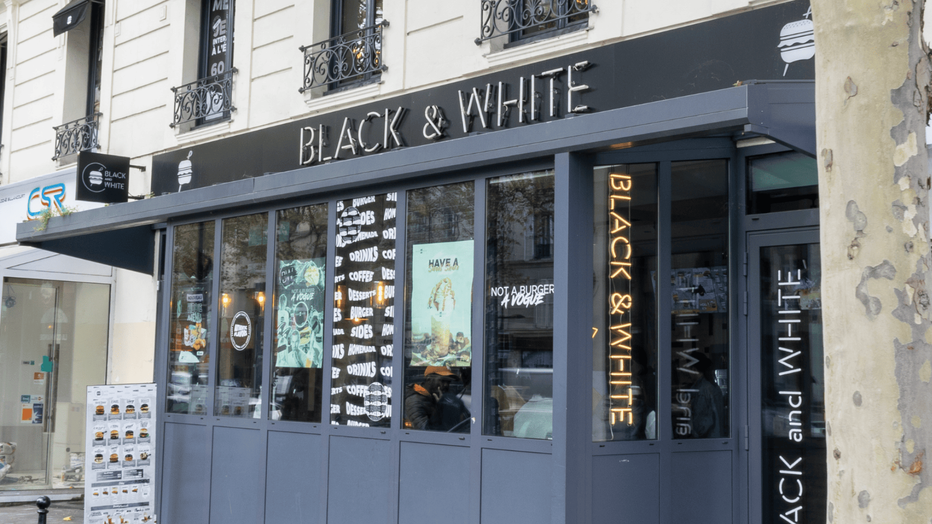 façade de restaurant burger noir et blanc au néon
