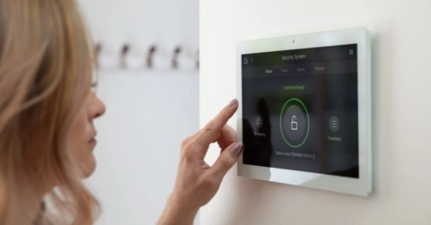 home security touchscreen showing disarmed status