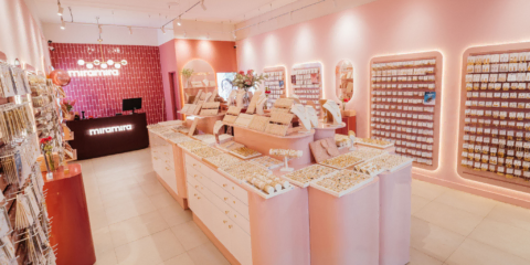 pink jewelry boutique interior with display islands