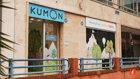 kumon tutoring center storefront with colorful murals