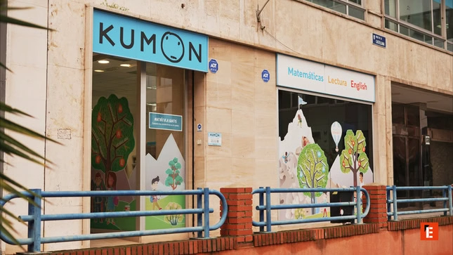 kumon tutoring center storefront with colorful murals