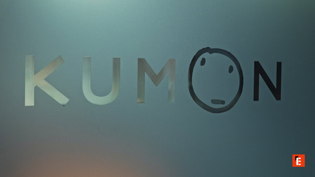 kumon frosted teal logo with hand drawn face