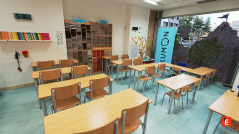 bright kumon tutoring classroom with neat desks
