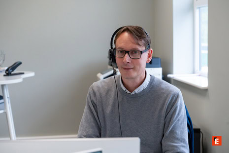 remote worker on video call with headset