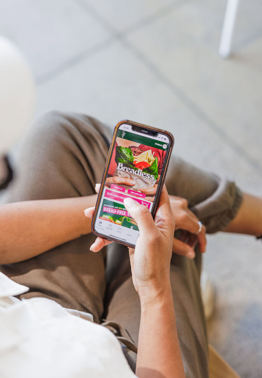using breadless food ordering app on smartphone