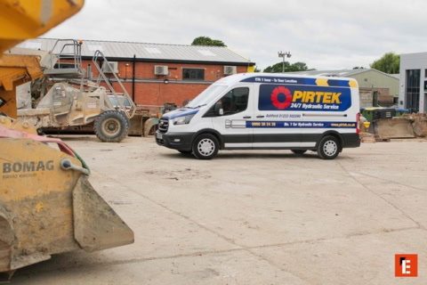 pirtek 24/7 hydraulic service van among heavy equipment