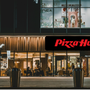 pizza hut at night with warm lit interior