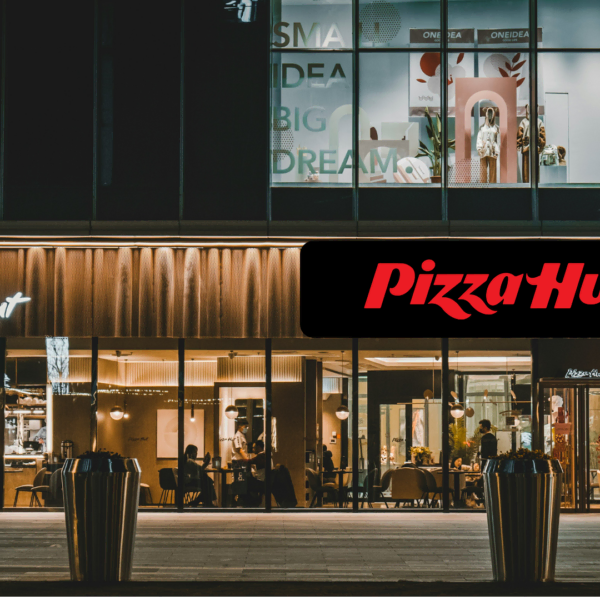 pizza hut at night with warm lit interior