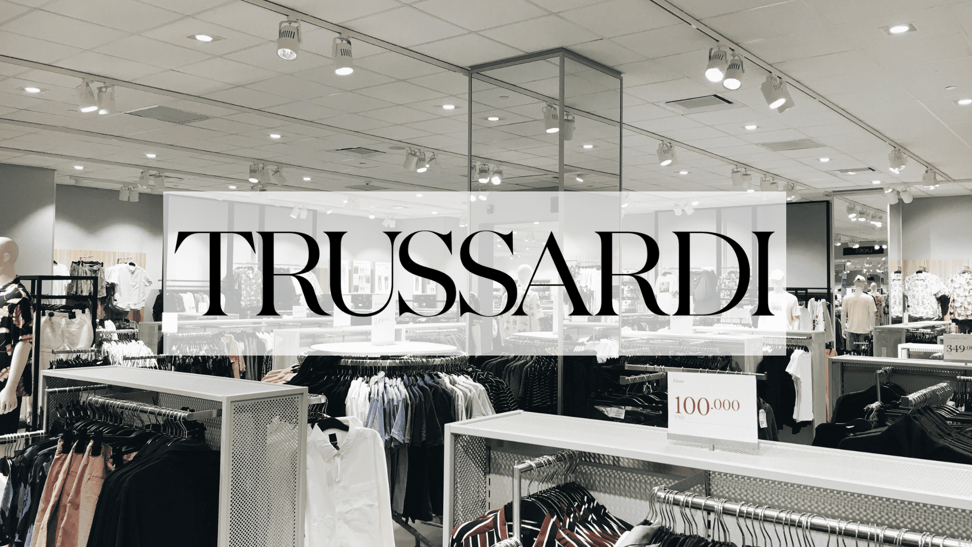 interno negozio trussardi: abbigliamento elegante e luminoso