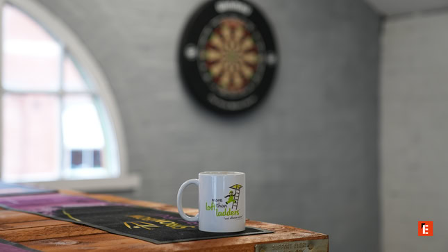 white ceramic mug on rustic wooden counter