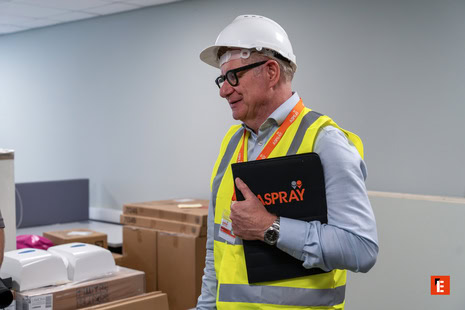 site supervisor inspecting warehouse deliveries