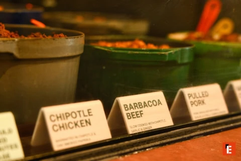 barbacoa and pulled pork taco counter close up