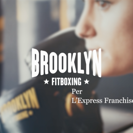 brooklyn fitboxing: logo su foto di allenamento sfocata