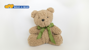 build a bear tan sherpa teddy with green ribbon