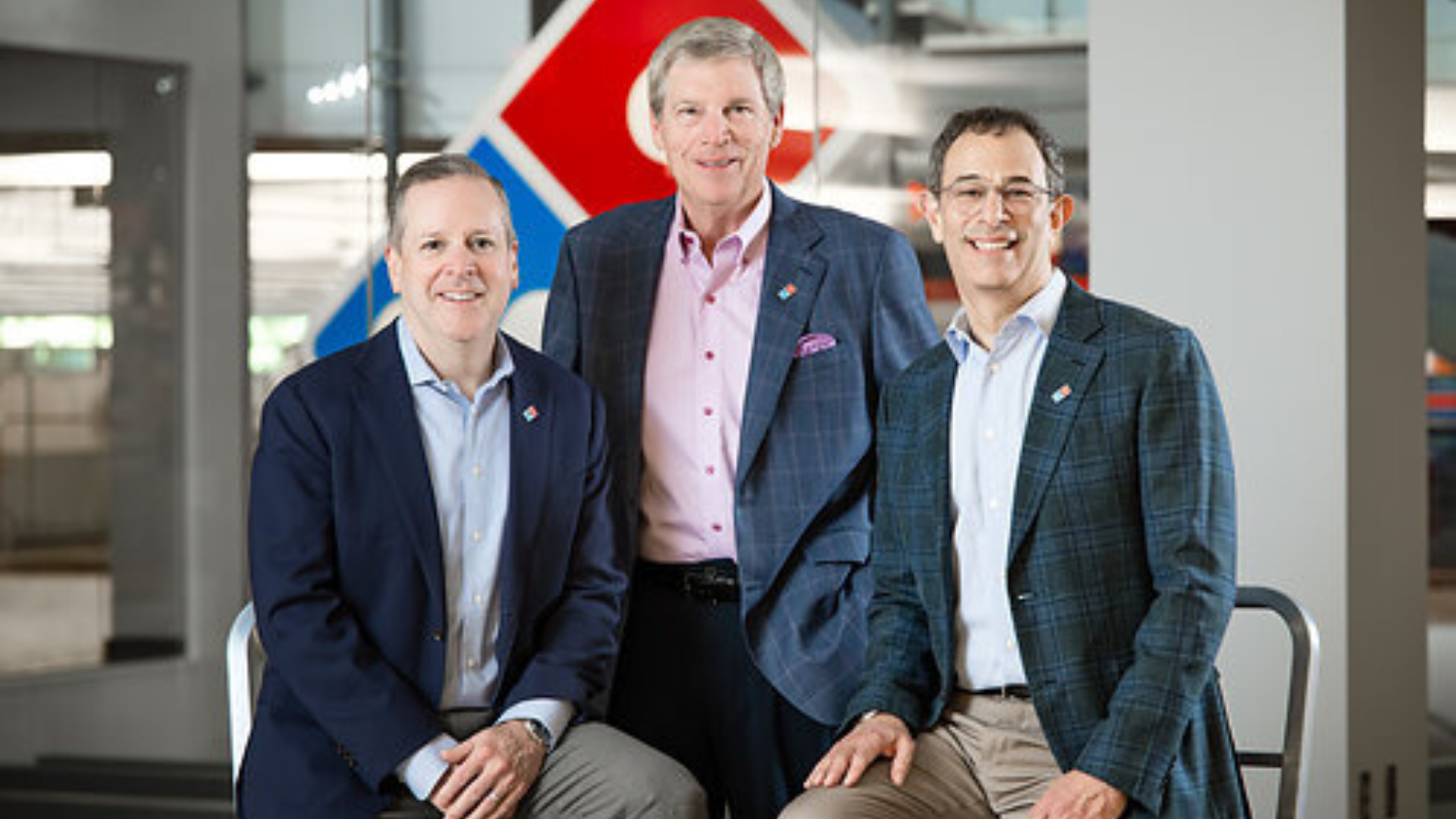 executive team portrait in modern office